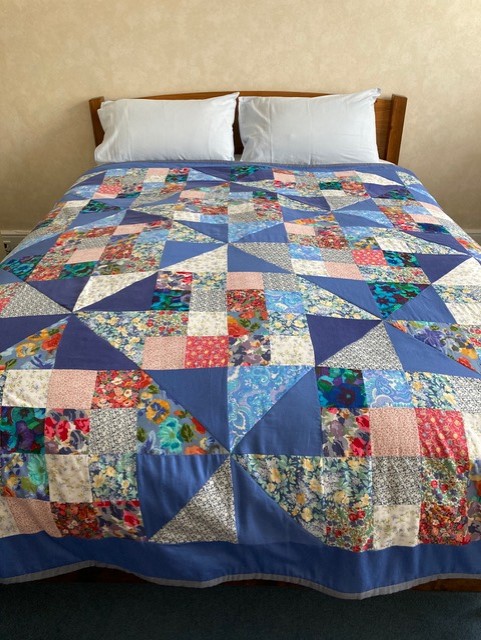 Bespoke Memory patchwork quilts stitched By Lisa Watson